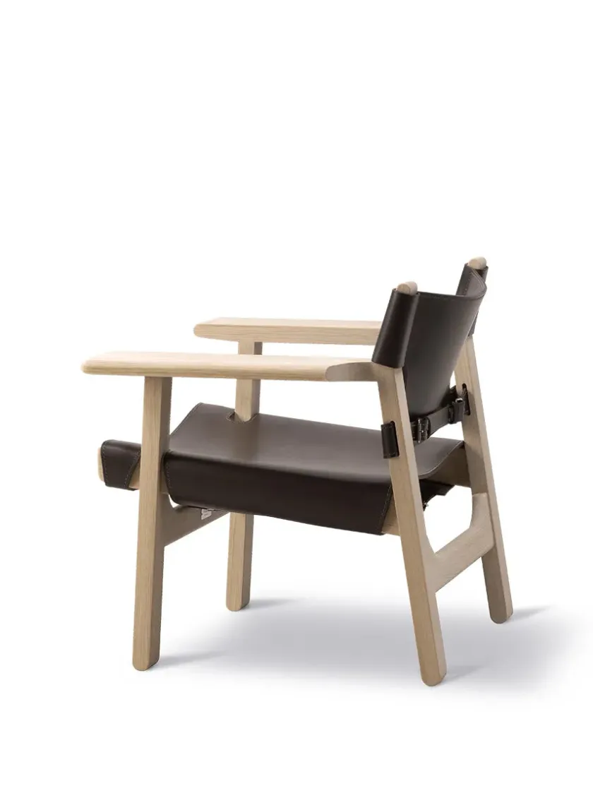 Fredericia Furniture Lænestole<Den Spanske Stol i sort læder, eg sort lak af Børge Mogensen