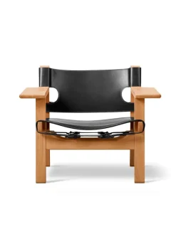 Fredericia Furniture Lænestole<Den Spanske Stol i sort læder, eg sort lak af Børge Mogensen