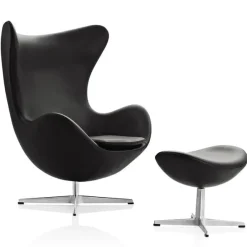 Fritz Hansen Lænestole<Ægget, Sort Essential læder, med returdrej inkl. skammel af Arne Jacobsen