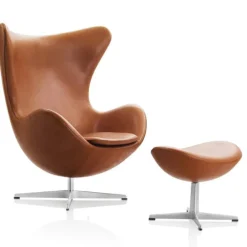 Fritz Hansen Lænestole<Ægget, Valnød Aura læder, med returdrej inkl. skammel af Arne Jacobsen