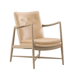 House of Finn Juhl Lænestole<Kaminstolen, valnød af Finn Juhl