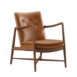 House of Finn Juhl Lænestole<Kaminstolen, valnød af Finn Juhl